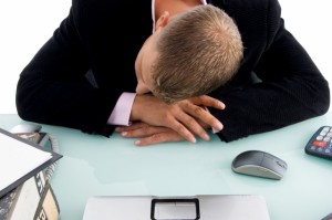 Businessman Sleeping at Desk